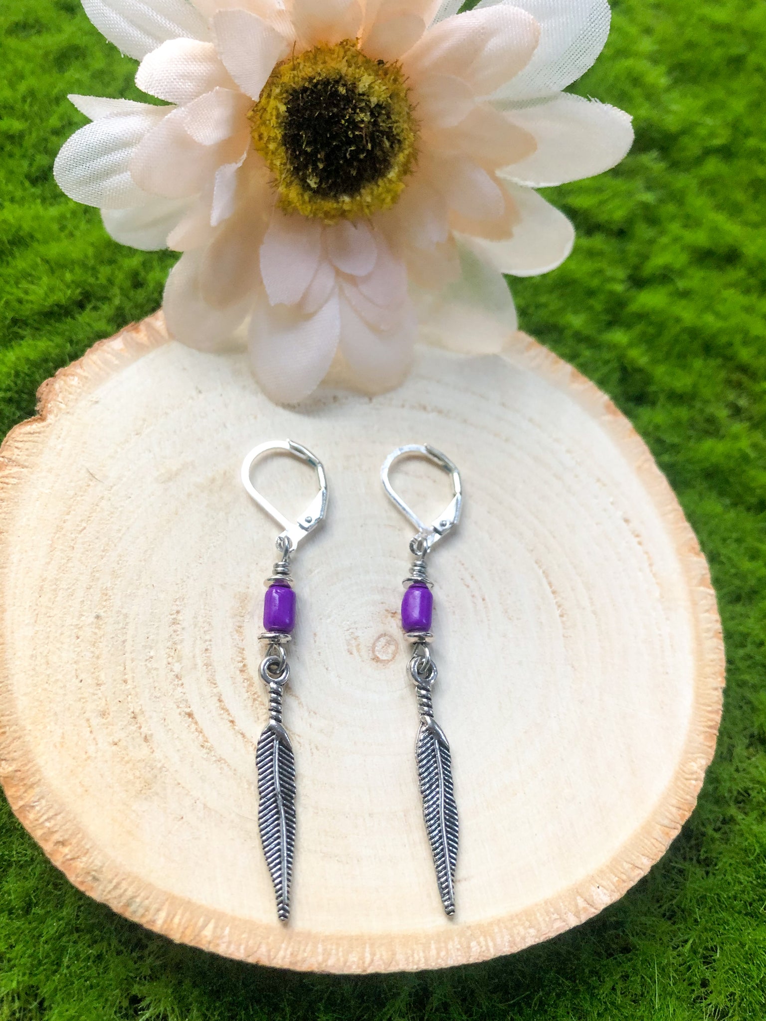 Purple feather earrings